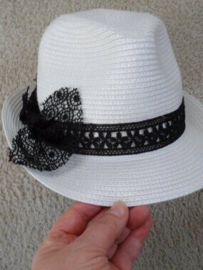 Mgid - white straw trilby hat with black band accented with delicate floral